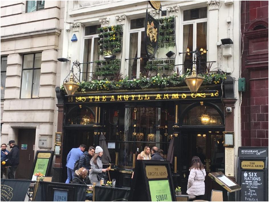 The Argyll Arms, an 18th-century pub with original mahogany panelling and Victorian snugs with etched glass partitions