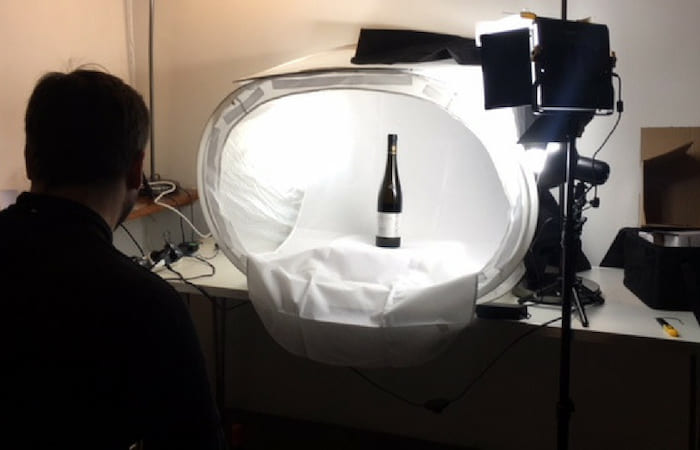 Mauricio Perez from our team taking pictures of each bottle submitted